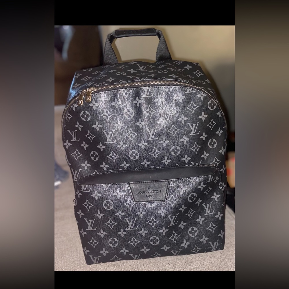 Authentic real leather great condition mid size black Louis Vuitton backpack